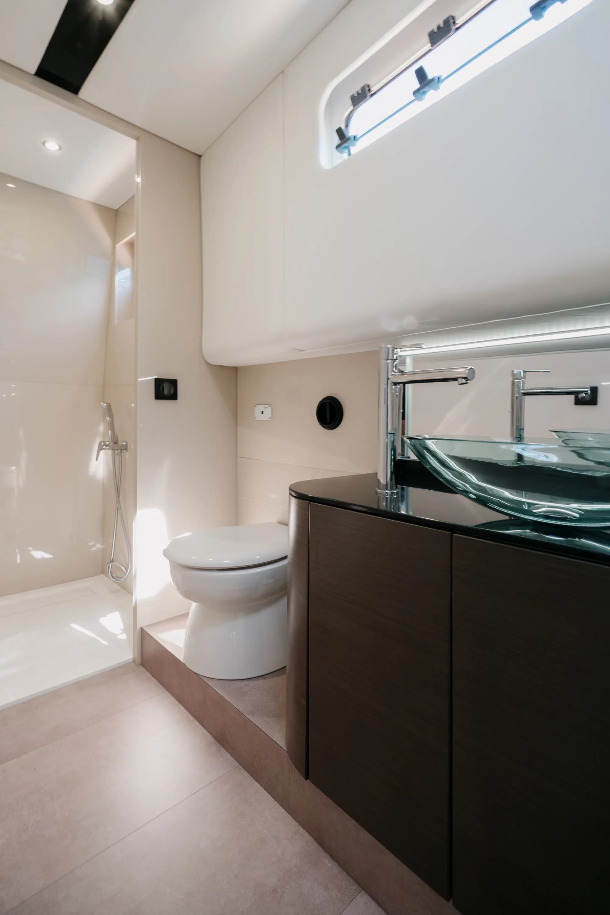 An interior of the Wia 520 Open finished in cream and pale oak with soft lighting.
